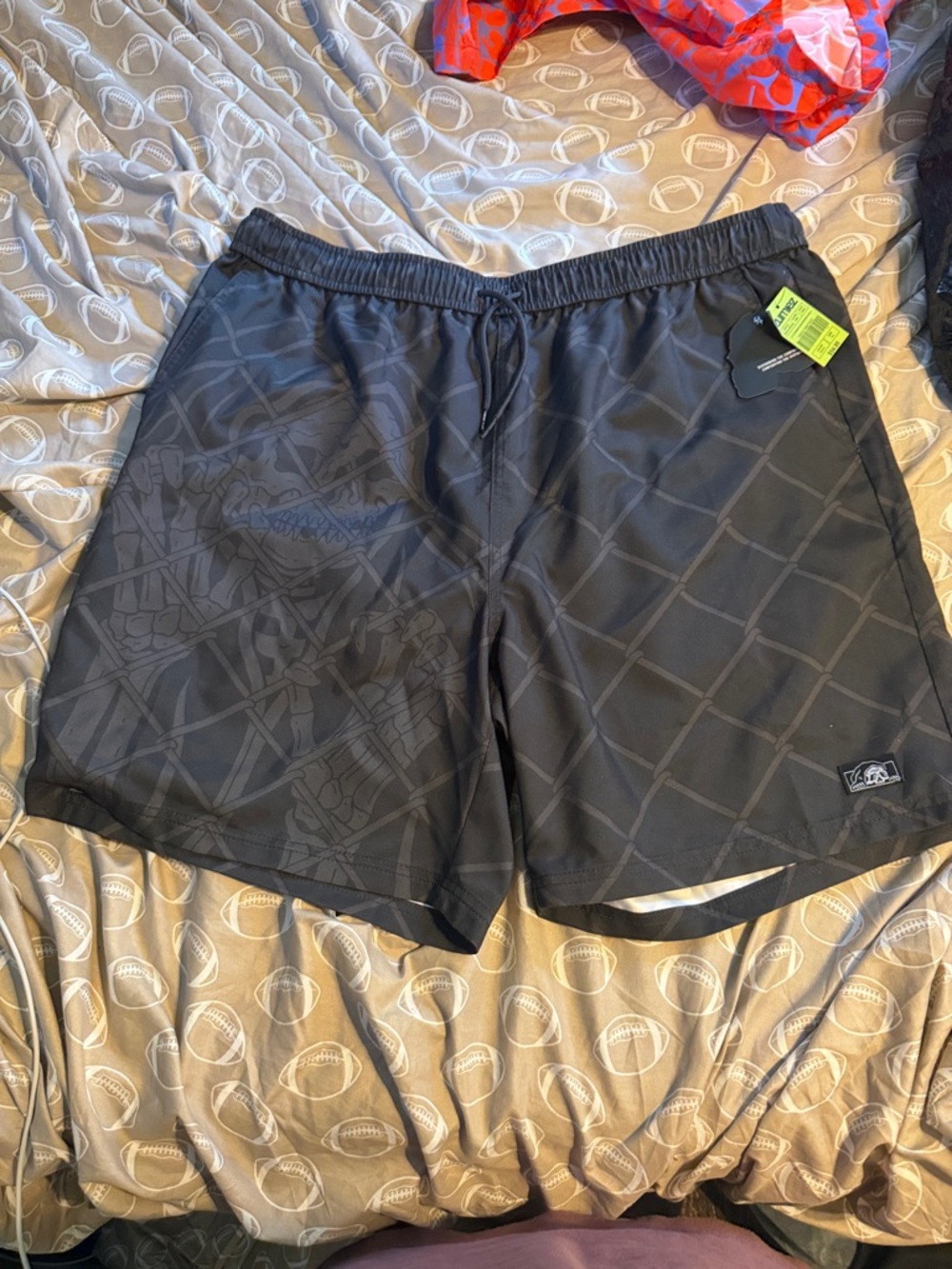 Men’s Black Swim Trunks with Subtle Graphic